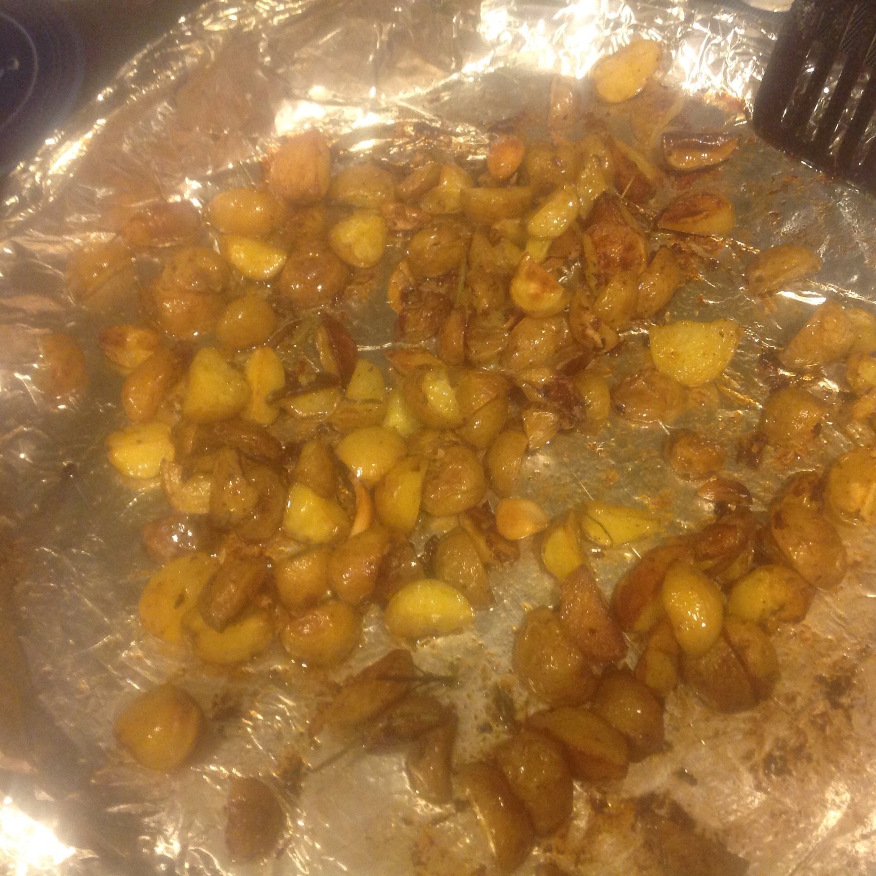 Simple spatchcock and garlic rosemary roasted potatoes — Big Green Egg