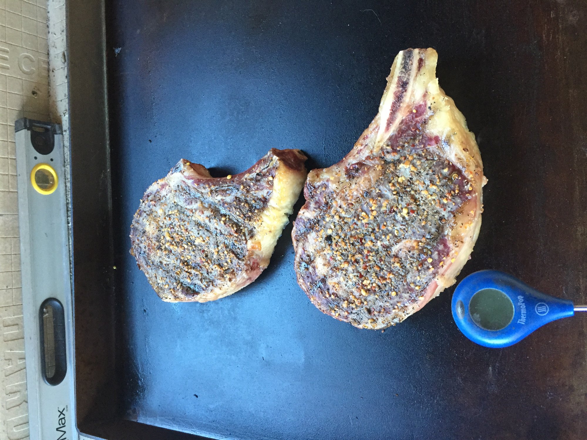 BIG ole ribeyes reverse seat on the flat top — Big Green Egg Forum
