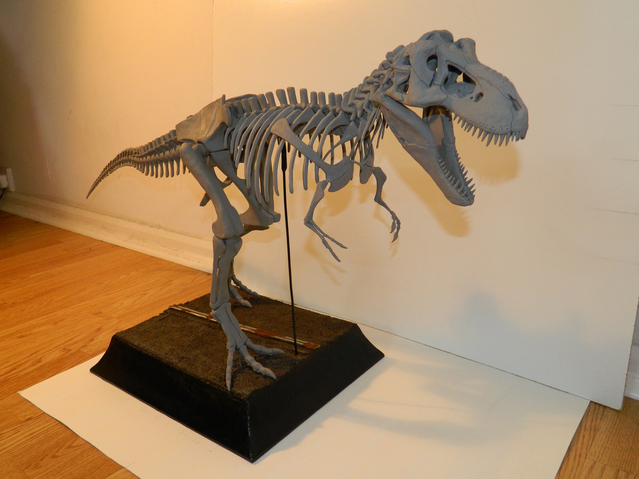 bronze dinosaur skeleton