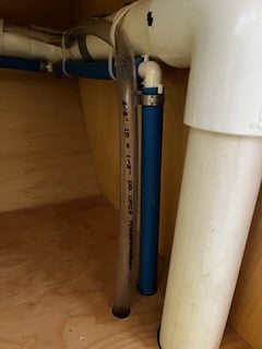 vent pipe below sink.jpeg