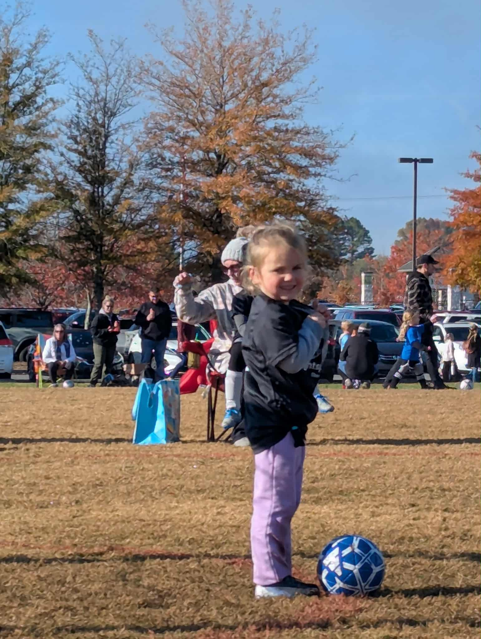Maislee about to kick the soccer ball.jpg