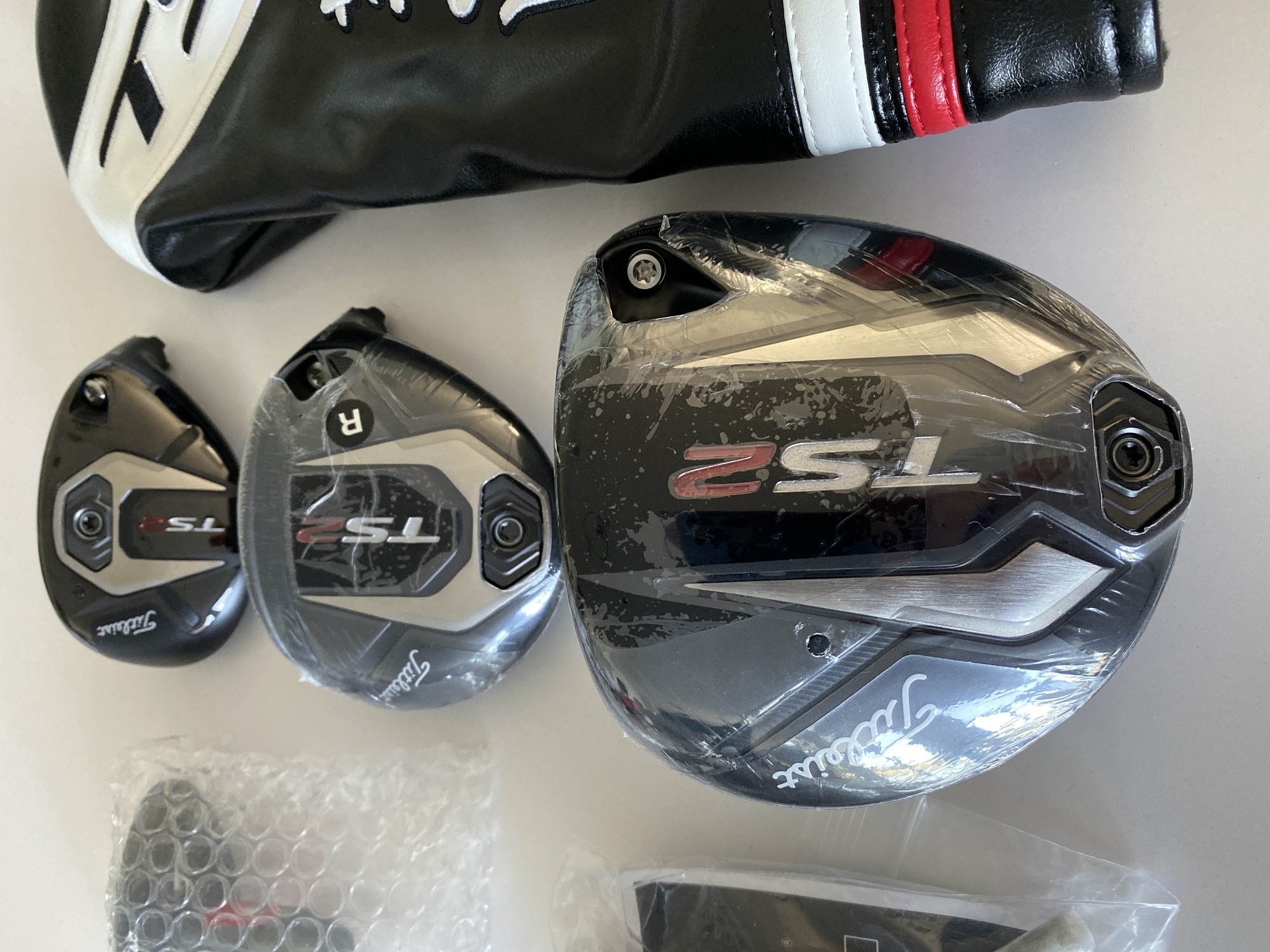 Titleist TS2 Driver, FW & Hybrid Heads also set of 5 Callaway head