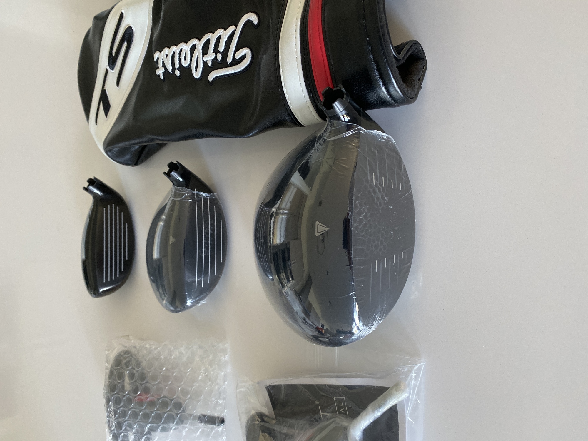 Titleist TS2 Driver, FW & Hybrid Heads also set of 5 Callaway head