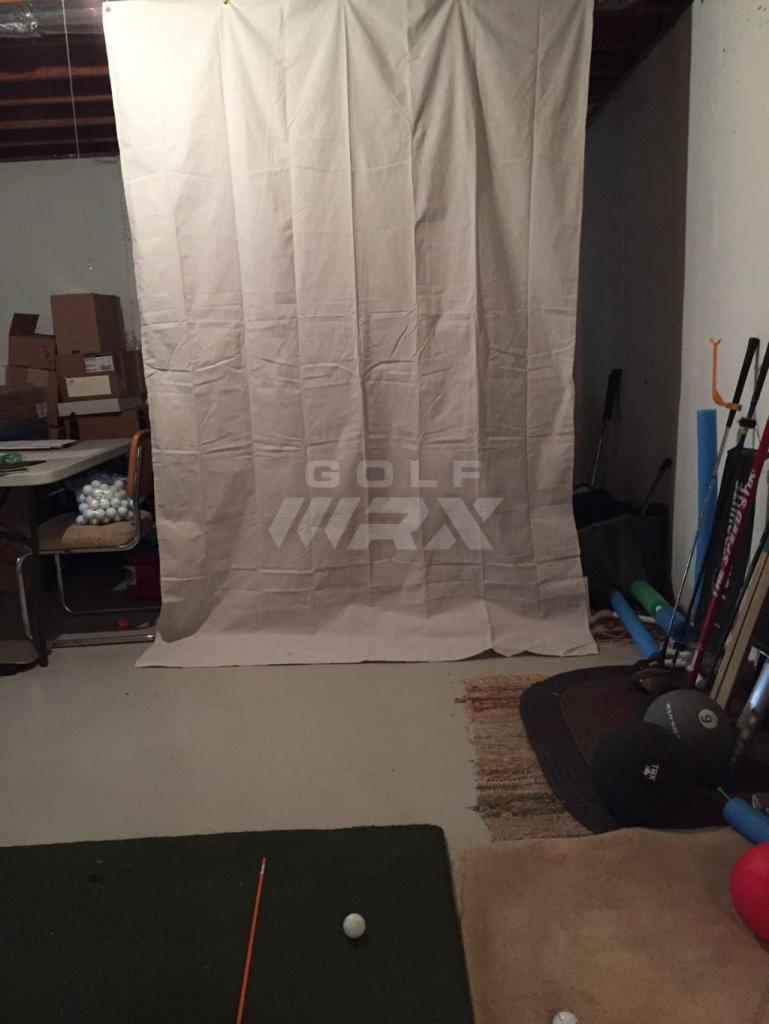 Indoor hitting setup Canvas tarp hung on toggle hooks — GolfWRX