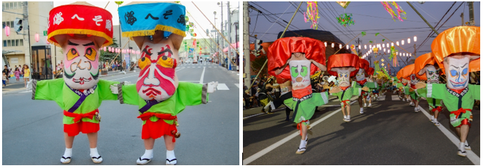 Many people with faces painted on their stomachs.