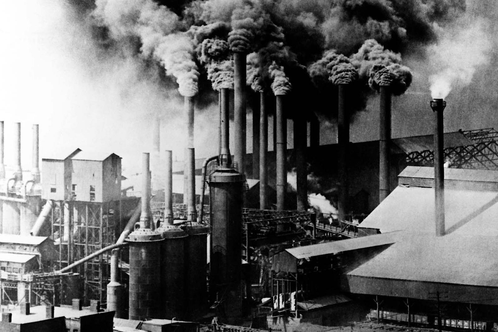 The industrial revolution. A picture of factories and smoke coming out of chimneys.