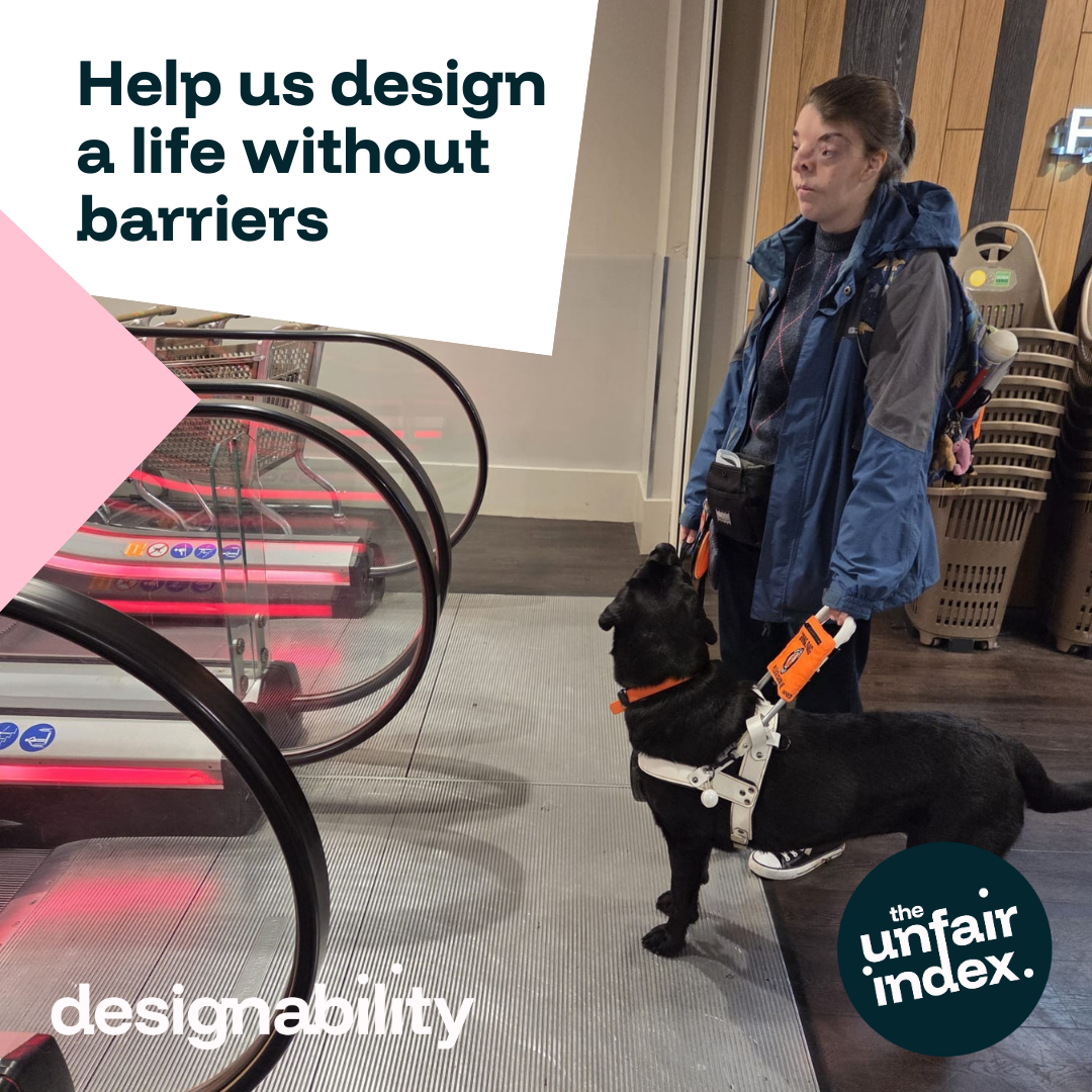 A guide dog owner stands in front of a set of escalators. Text Reads: Help Us Design a life without barriers.
