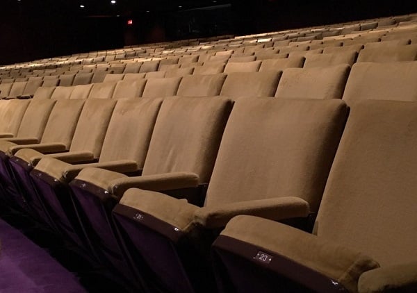 Folding seats in a theatre