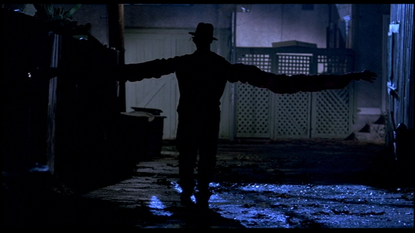 A-Nightmare-on-Elm-Street-1984-Freddy-arms-outstretched.png