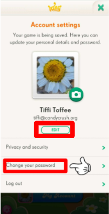 King account settings interface with a close button at the top. A user profile is displayed, including a username 'Tiffi Toffee' and an obscured profile picture, with an edit button beside it. Options for changing the password and logging out are listed below. The bottom features a thumb icon pointing to the 'Change your password' option."