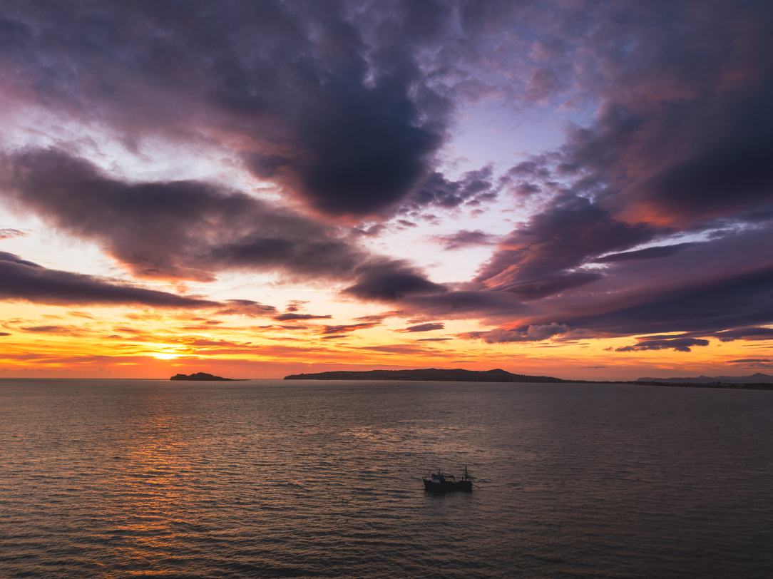 2026-01-14 Portmarnock lenticulars trawler sunrise.jpg