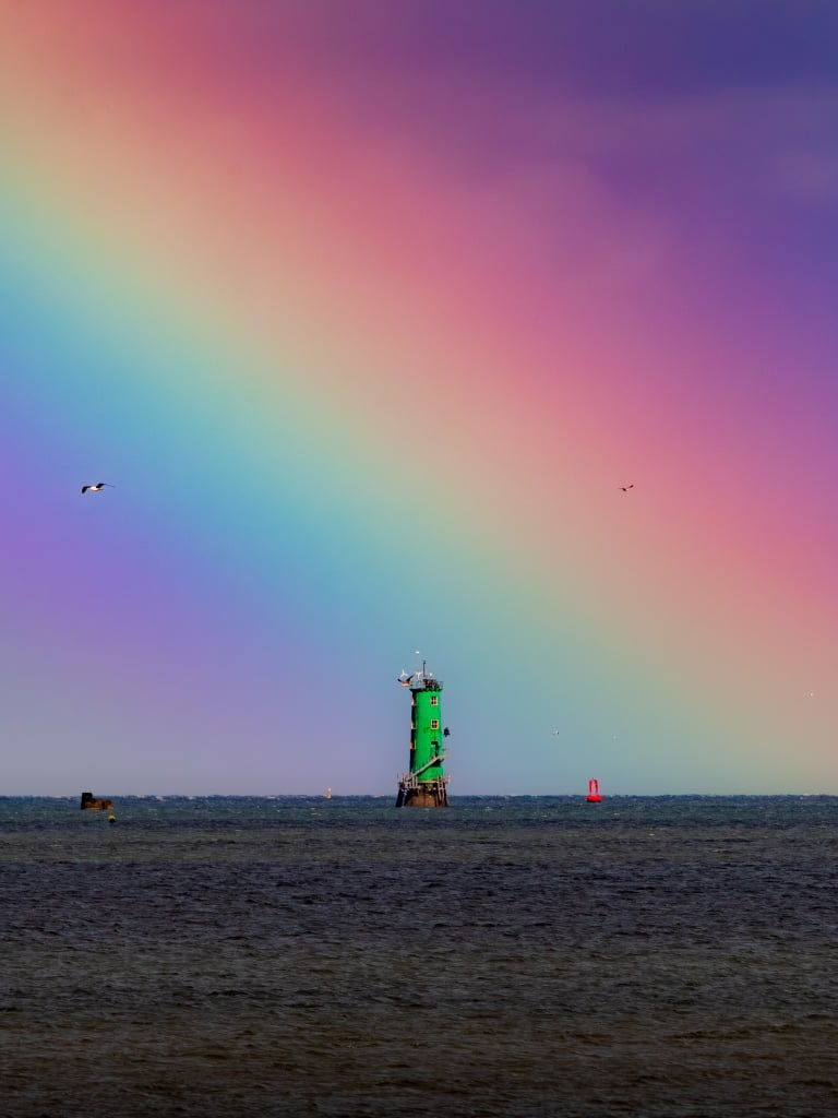 2026-06-04 North Bull Lighthouse rainbow from Clontarf.jpg