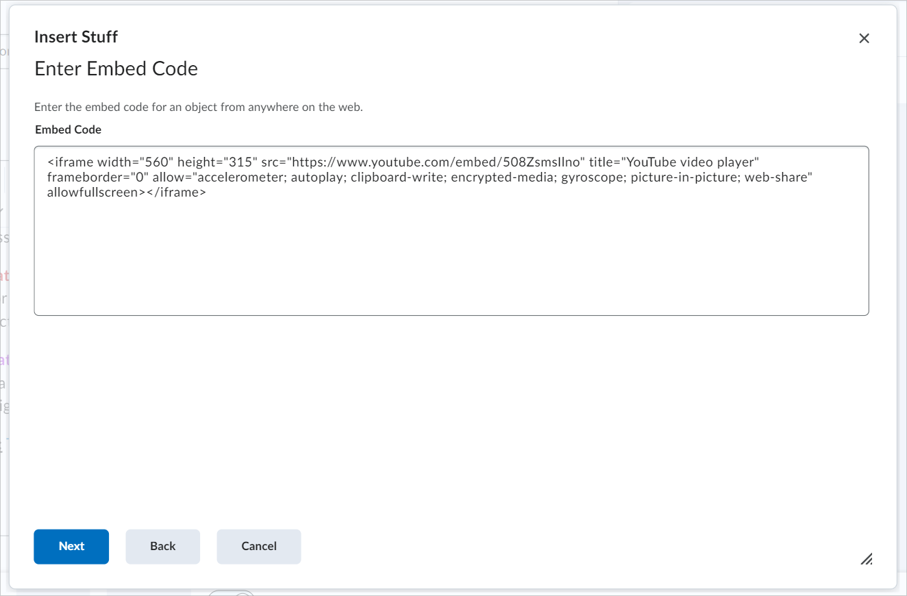 Het dialoogvenster Insert Stuff® met het tekstvak met de insluitcode. De knop Volgende bevindt zich onderaan.