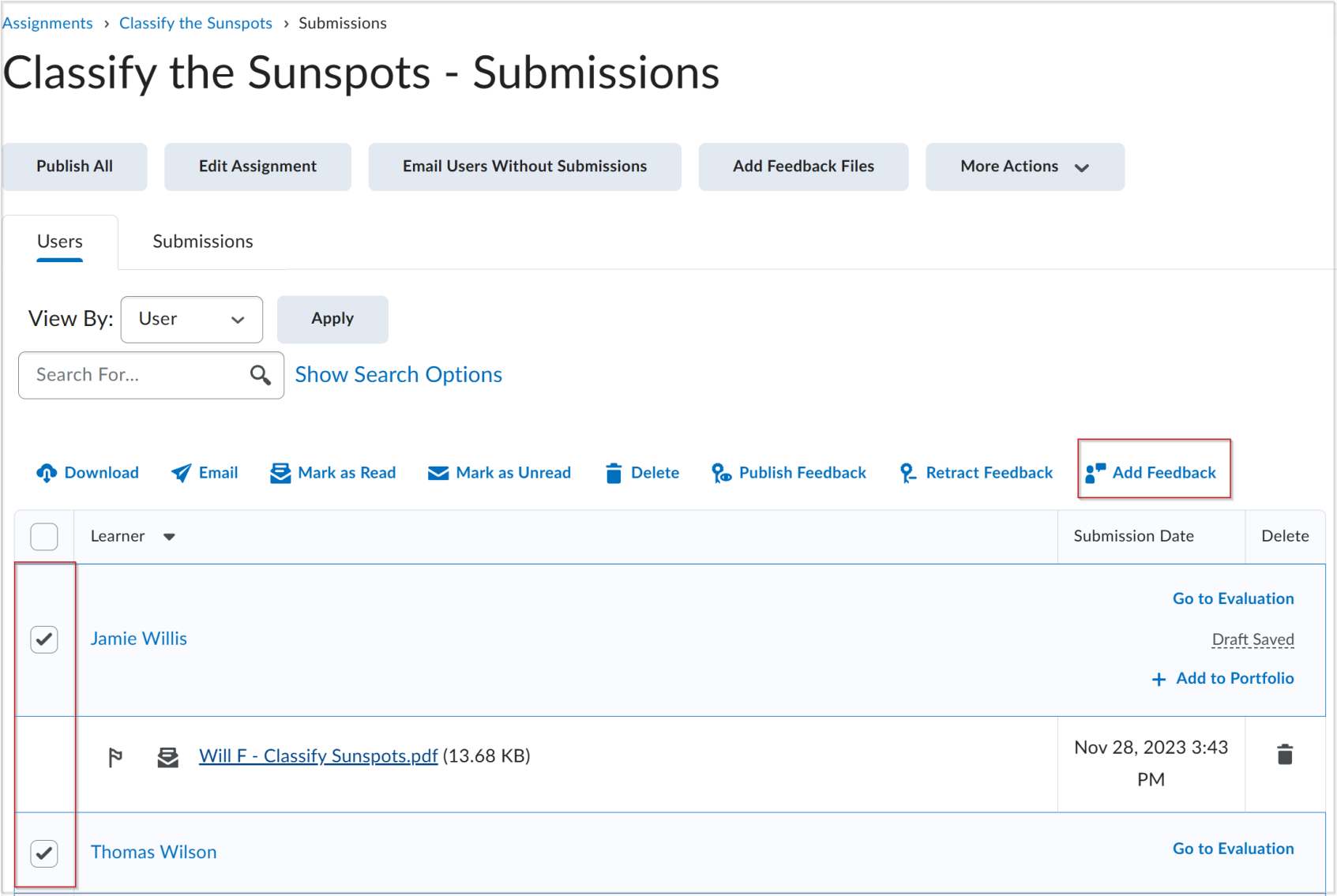 La page Soumissions de travaux de Brightspace, dans laquelle des apprenants sont sélectionnés et le bouton « Donner une rétroaction » est mis en évidence.