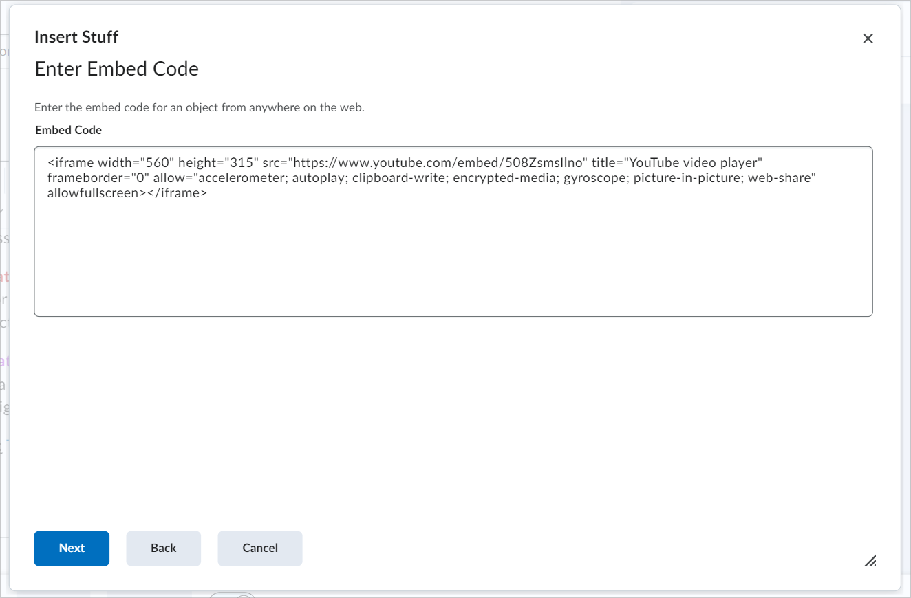La boîte de dialogue Insérer quelque chose présente la zone de texte comportant le code incorporé. Le bouton Suivant se trouve en bas.
