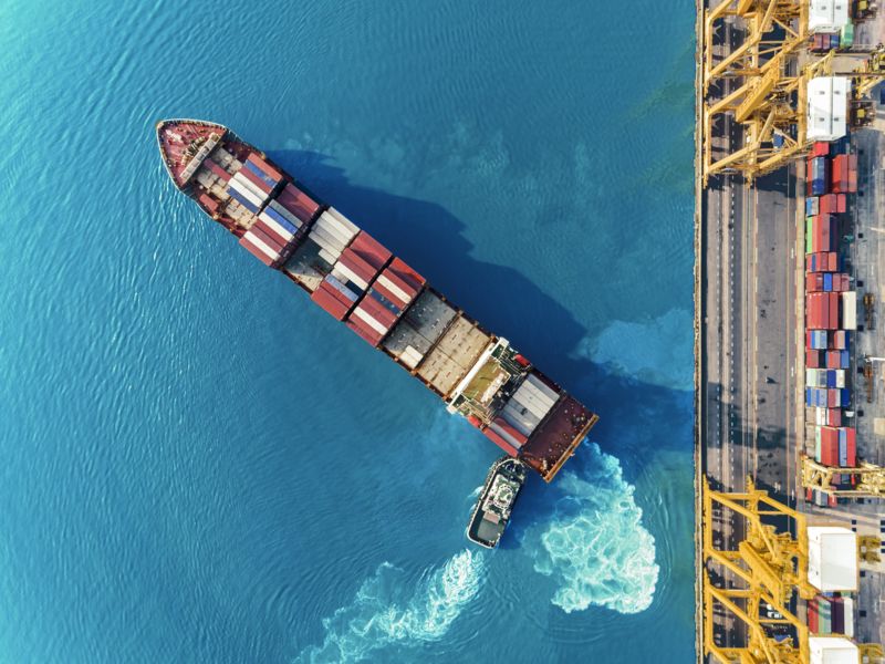 aerial top view container ship crane Lifting container for Logistic by sea in warehouse_Medium.png