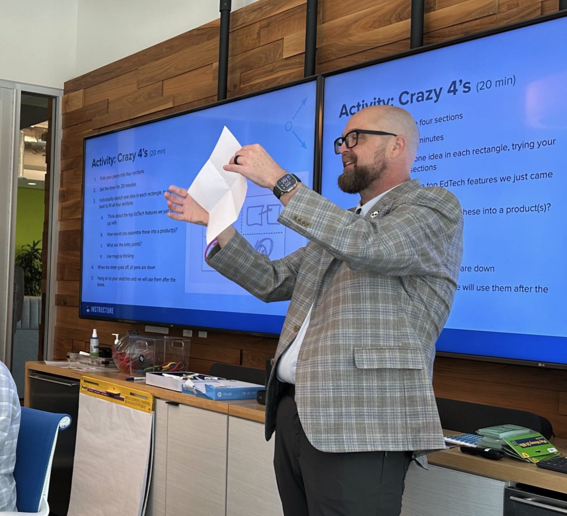Instructure employee leads an activity called crazy fours
