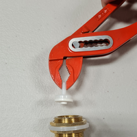 Step 4.4 Use pliers to remove old tap valve.png Step 4.4 Use pliers to remove old tap valve.png