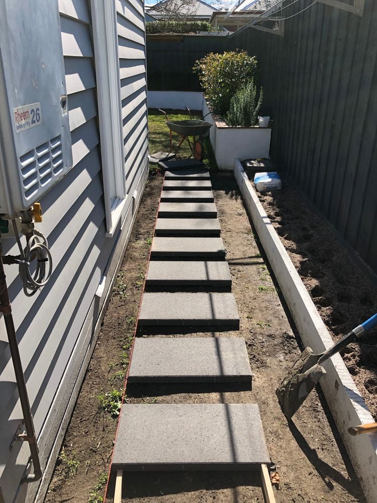 Laying Pavers.jpg Laying Pavers.jpg