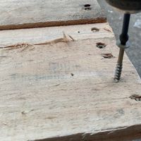 4.2 Boards being screwed into place.jpg 4.2 Boards being screwed into place.jpg