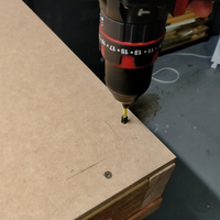 Step 5.4 Screw MDF panel to drawer frame.png Step 5.4 Screw MDF panel to drawer frame.png
