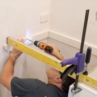 Step 6.1 Measure cut and predrill rail.jpeg Step 6.1 Measure cut and predrill rail.jpeg