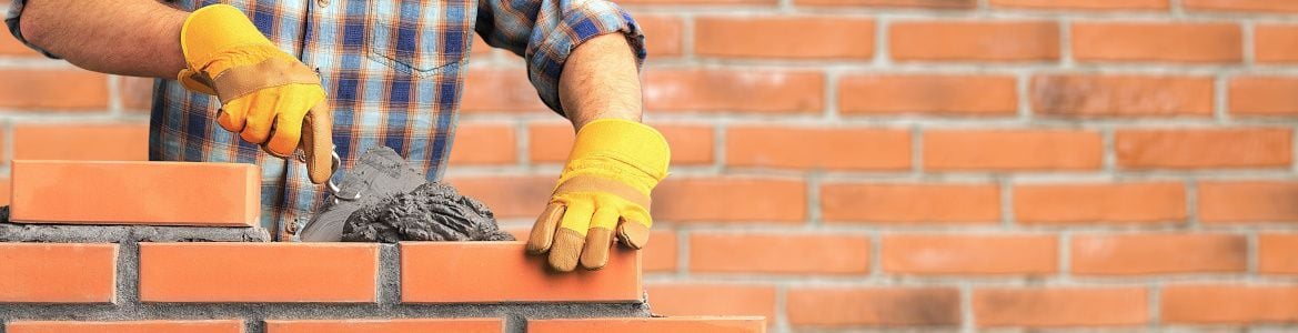 man-laying-bricks.jpeg man-laying-bricks.jpeg