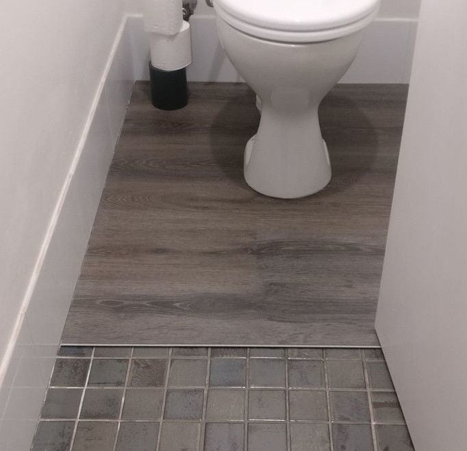 vinyl_flooring_over_toilet_tiles.jpg vinyl_flooring_over_toilet_tiles.jpg