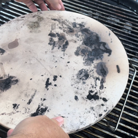 5. Position your pizza stone in the middle of the grill.png 5. Position your pizza stone in the middle of the grill.png
