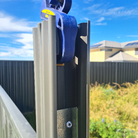 2.2 Slide the uprights over the bracket and clamp them together.png 2.2 Slide the uprights over the bracket and clamp them together.png