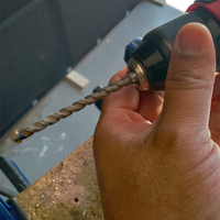 Step 2.5. Change to 8mm masonry drill bit.png Step 2.5. Change to 8mm masonry drill bit.png