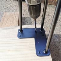 3.2 Screwing legs on to tabletop.jpg 3.2 Screwing legs on to tabletop.jpg