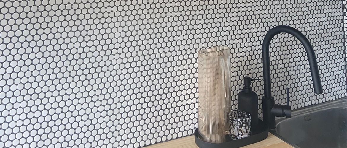 Budget laundry renovation with tiled splashback.jpeg Budget laundry renovation with tiled splashback.jpeg