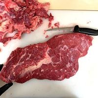 Step 1 - Brisket being trimmed.jpg Step 1 - Brisket being trimmed.jpg