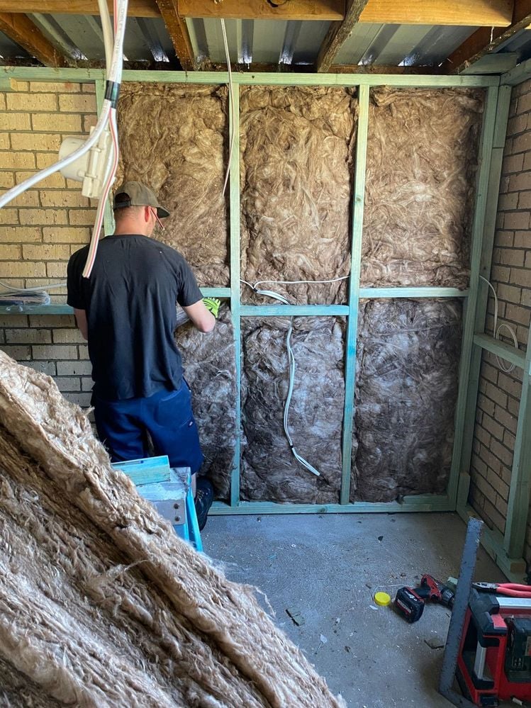 installing-insulation.jpeg installing-insulation.jpeg