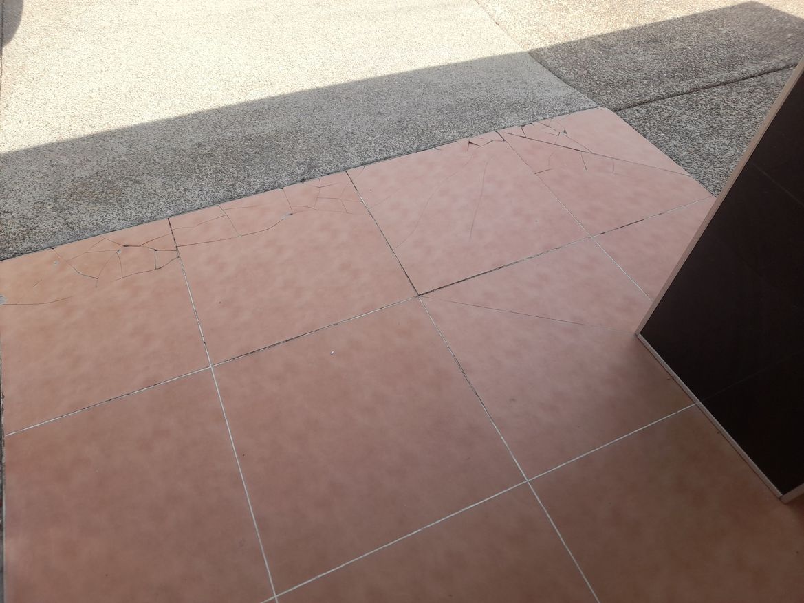 repairs to tiles.jpg repairs to tiles.jpg