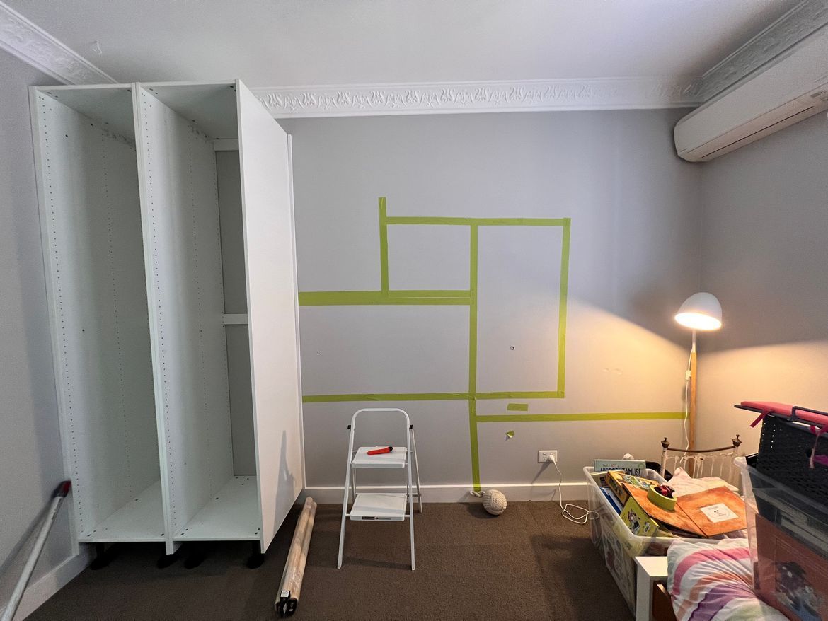 Marking up wall.jpeg Marking up wall.jpeg