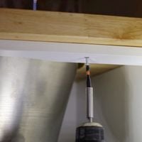 Step 8.2 Secure to bridging rail.jpeg Step 8.2 Secure to bridging rail.jpeg