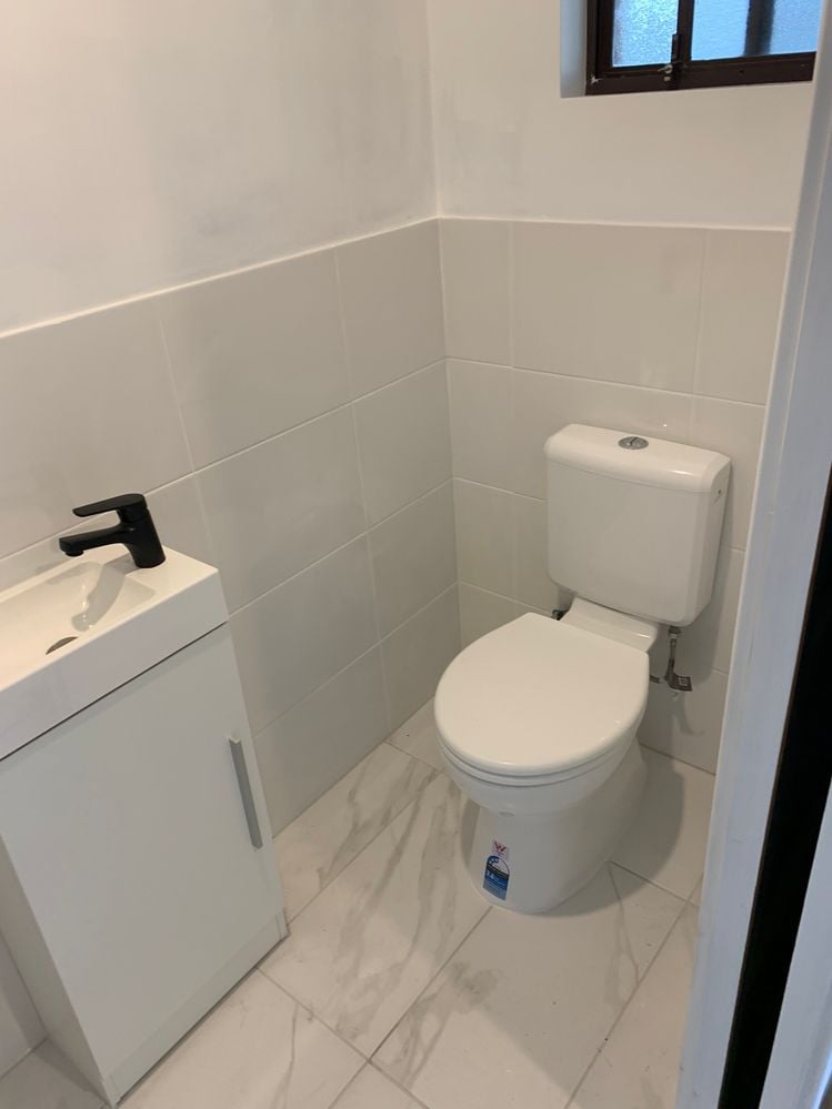 Toilet and vanity in.JPG Toilet and vanity in.JPG