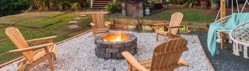 Outdoor fire pit area with hanging chairs.jpeg Outdoor fire pit area with hanging chairs.jpeg