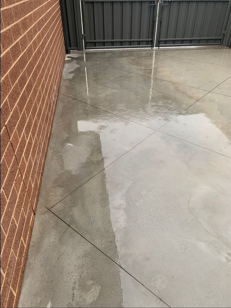 Water flowing towards brick wall.jpg Water flowing towards brick wall.jpg