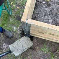 Step 6.2. Pouring concrete into holes.png Step 6.2. Pouring concrete into holes.png