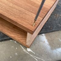 3.1 Drill small holes and screw in the desk bottom.jpg 3.1 Drill small holes and screw in the desk bottom.jpg