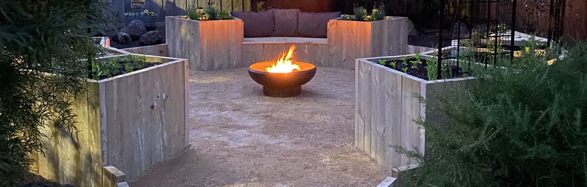Circular raised planters with seating fire pit.JPG Circular raised planters with seating fire pit.JPG