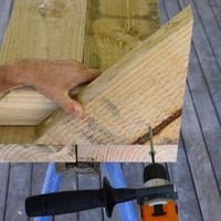 Step 10.2 Attach triangle support bracket to seat.jpg Step 10.2 Attach triangle support bracket to seat.jpg