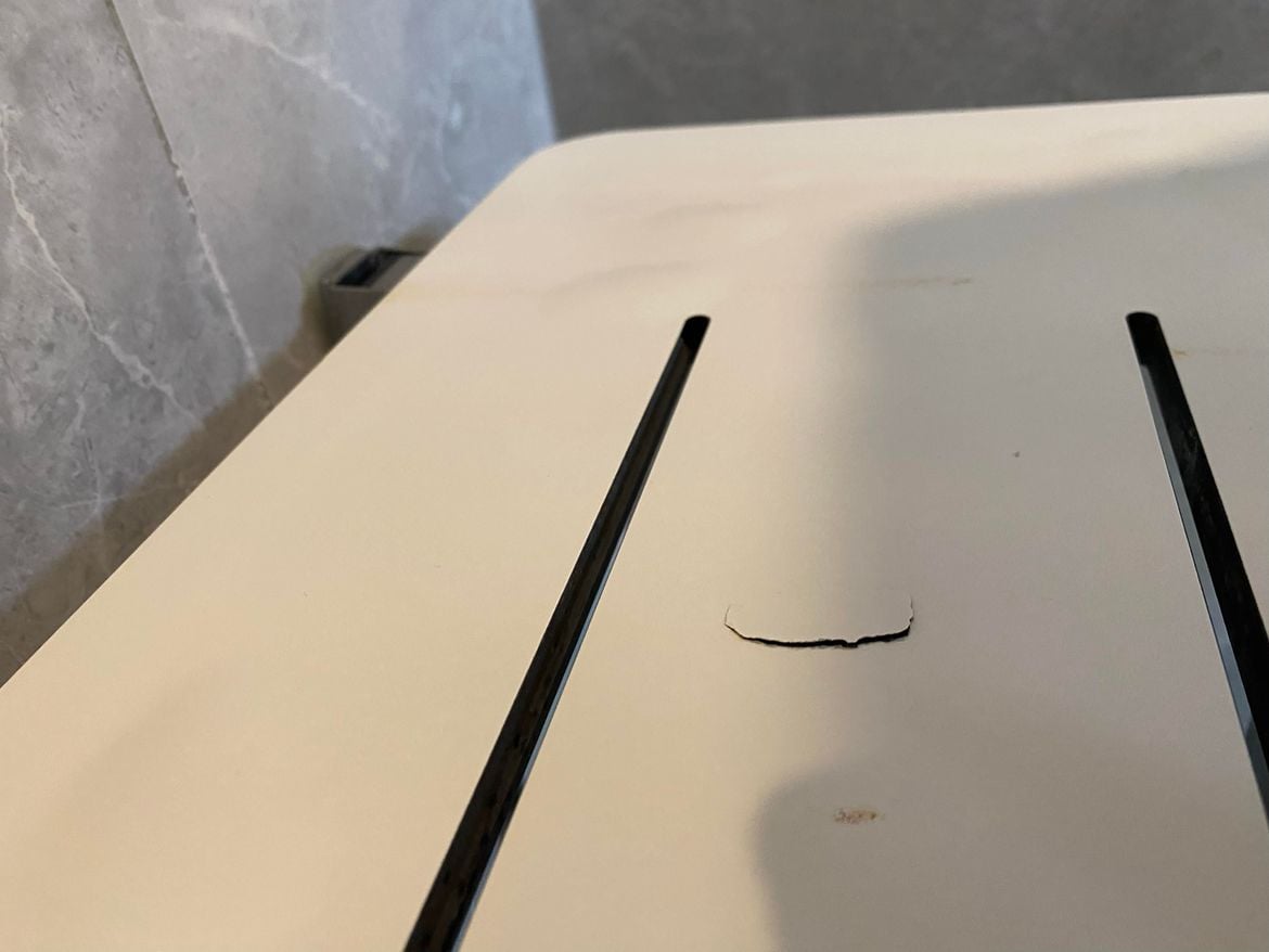 Shower bench ding (angle 2).jpg Shower bench ding (angle 2).jpg