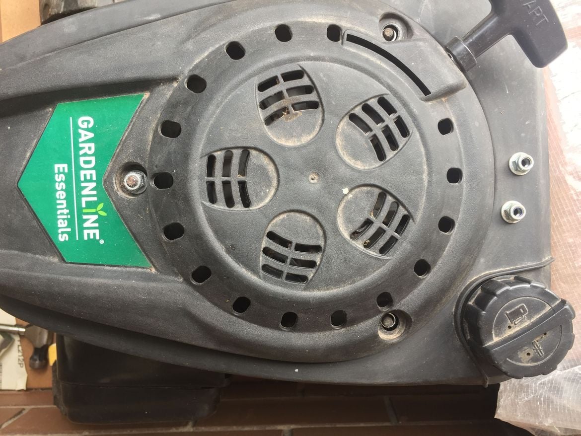 LawnMower_EngineCover_2NutsRemoved_1Nut_Stuck.JPG LawnMower_EngineCover_2NutsRemoved_1Nut_Stuck.JPG