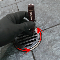 1.2 Using screwdriver to assist with opening waste grate.png 1.2 Using screwdriver to assist with opening waste grate.png
