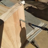 7.5 Fixing screws through side panel into shelf.jpeg 7.5 Fixing screws through side panel into shelf.jpeg