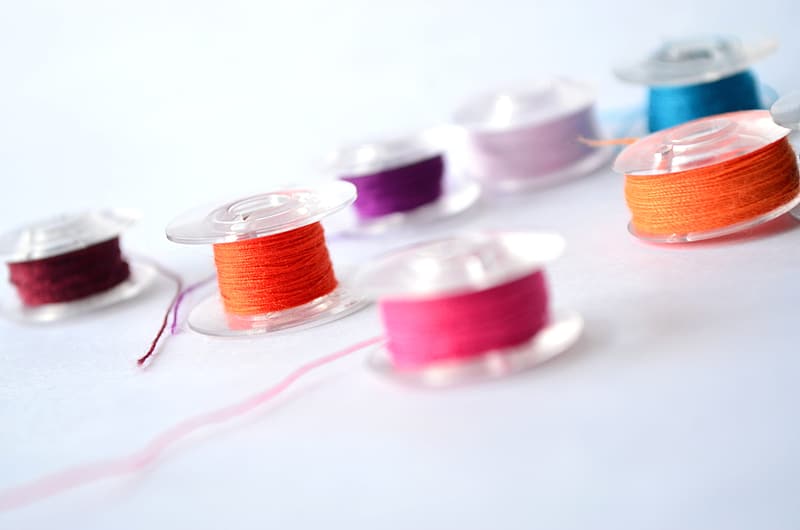 red-blue-and-pink-thread-spool.jpg red-blue-and-pink-thread-spool.jpg